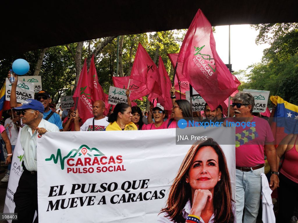 CARACAS, VENEZUELA, OCTOBER 22, 2026: Opposition supporters and leaders gather near Plaza Venezuela in Caracas to demand a timetable for presidential elections, the release of political prisoners and guarantees for opposition leader Maria Corina Machado’s safe return to the country. The demonstration forms part of nationwide mobilisations called by her Vente Venezuela movement. (Photo by Mario Flores/JNA Press via Nexpher Images)
