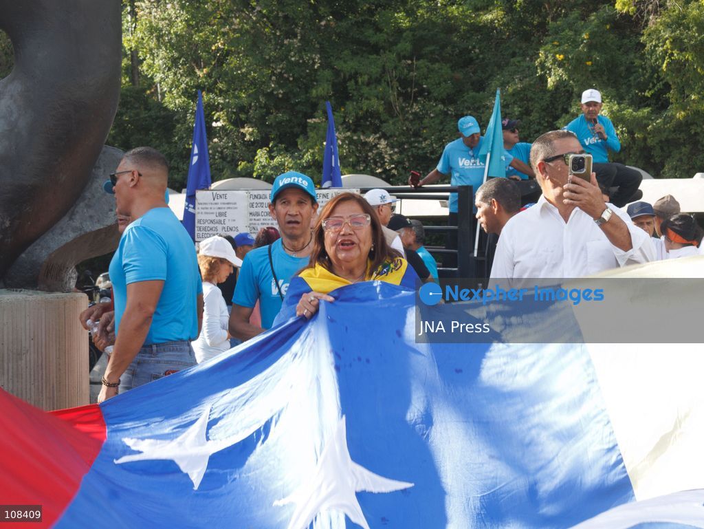 CARACAS, VENEZUELA, OCTOBER 22, 2026: Opposition supporters and leaders gather near Plaza Venezuela in Caracas to demand a timetable for presidential elections, the release of political prisoners and guarantees for opposition leader Maria Corina Machado’s safe return to the country. The demonstration forms part of nationwide mobilisations called by her Vente Venezuela movement. (Photo by Mario Flores/JNA Press via Nexpher Images)