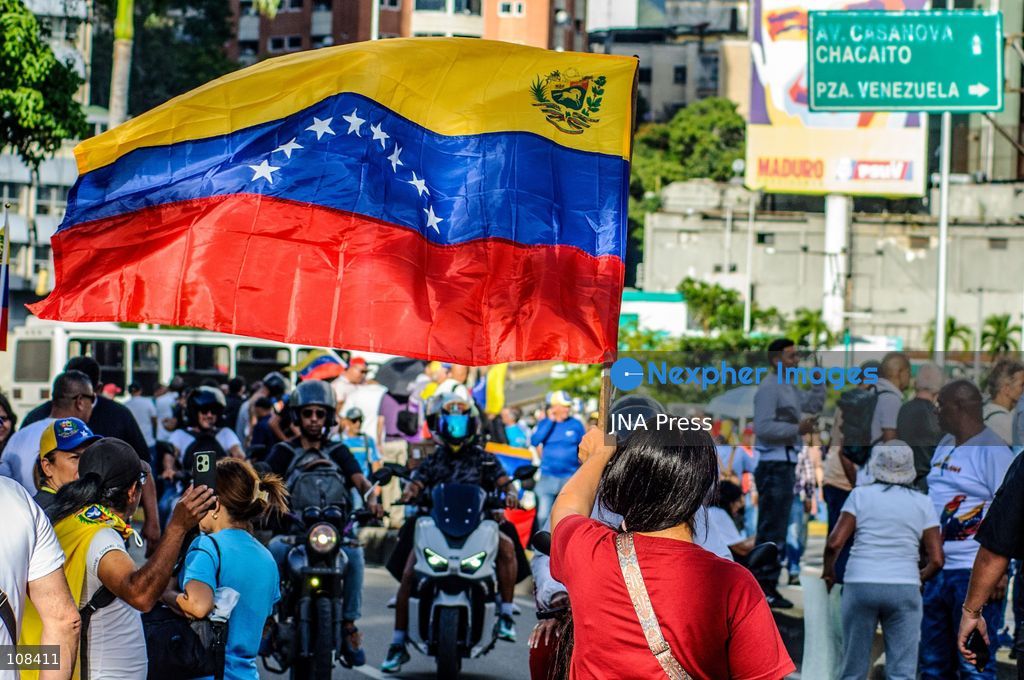 CARACAS, VENEZUELA, OCTOBER 22, 2026: Opposition supporters and leaders gather near Plaza Venezuela in Caracas to demand a timetable for presidential elections, the release of political prisoners and guarantees for opposition leader Maria Corina Machado’s safe return to the country. The demonstration forms part of nationwide mobilisations called by her Vente Venezuela movement. (Photo by Mario Flores/JNA Press via Nexpher Images)
