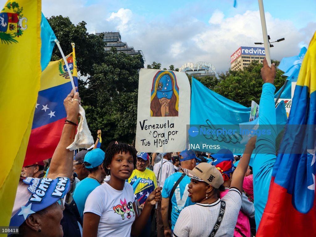 CARACAS, VENEZUELA, OCTOBER 22, 2026: Opposition supporters and leaders gather near Plaza Venezuela in Caracas to demand a timetable for presidential elections, the release of political prisoners and guarantees for opposition leader Maria Corina Machado’s safe return to the country. The demonstration forms part of nationwide mobilisations called by her Vente Venezuela movement. (Photo by Mario Flores/JNA Press via Nexpher Images)