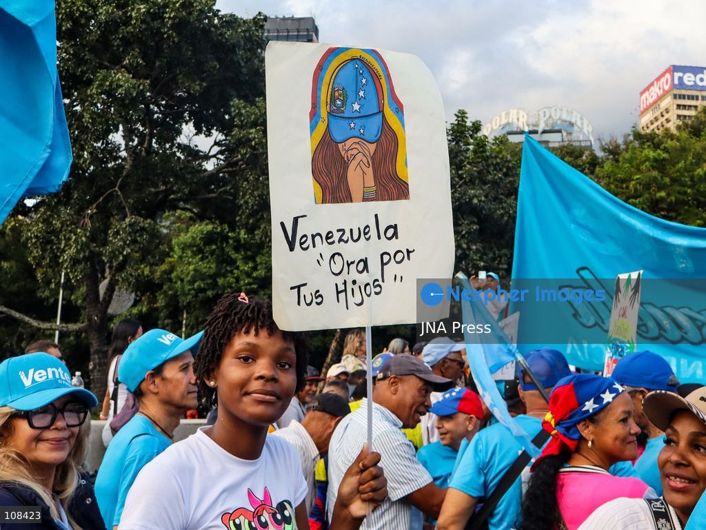 CARACAS, VENEZUELA, OCTOBER 22, 2026: Opposition supporters and leaders gather near Plaza Venezuela in Caracas to demand a timetable for presidential elections, the release of political prisoners and guarantees for opposition leader Maria Corina Machado’s safe return to the country. The demonstration forms part of nationwide mobilisations called by her Vente Venezuela movement. (Photo by Mario Flores/JNA Press via Nexpher Images)