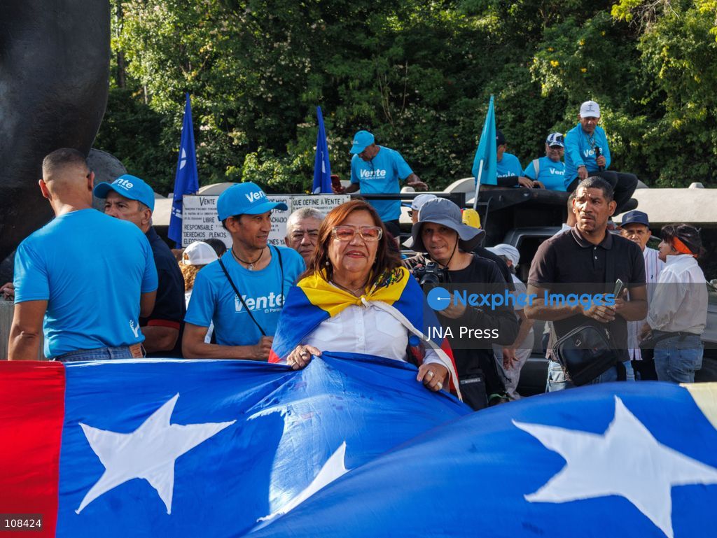 CARACAS, VENEZUELA, OCTOBER 22, 2026: Opposition supporters and leaders gather near Plaza Venezuela in Caracas to demand a timetable for presidential elections, the release of political prisoners and guarantees for opposition leader Maria Corina Machado’s safe return to the country. The demonstration forms part of nationwide mobilisations called by her Vente Venezuela movement. (Photo by Mario Flores/JNA Press via Nexpher Images)