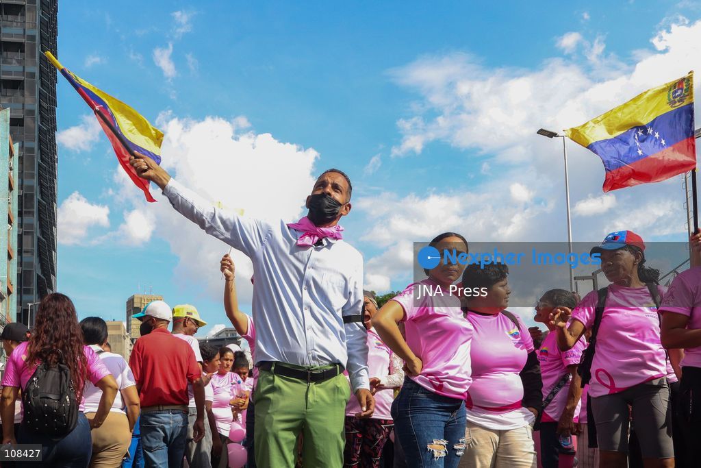 CARACAS, VENEZUELA, OCTOBER 22, 2026: Government supporters march from Plaza Venezuela towards Santa Capilla in central Caracas during a mobilisation marking Breast Cancer Awareness Month and honouring Venezuelan women. The march, called by the ruling United Socialist Party of Venezuela (PSUV), raises awareness of breast cancer and supports people affected by the disease. (Photo by Mario Flores/JNA Press via Nexpher Images)