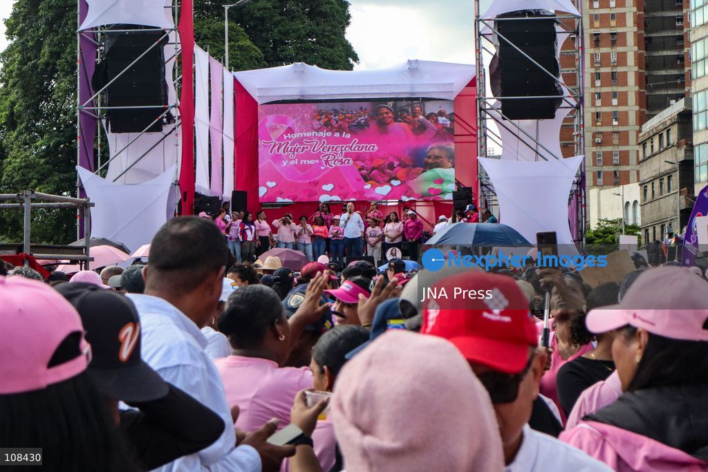 CARACAS, VENEZUELA, OCTOBER 22, 2026: Government supporters march from Plaza Venezuela towards Santa Capilla in central Caracas during a mobilisation marking Breast Cancer Awareness Month and honouring Venezuelan women. The march, called by the ruling United Socialist Party of Venezuela (PSUV), raises awareness of breast cancer and supports people affected by the disease. (Photo by Mario Flores/JNA Press via Nexpher Images)