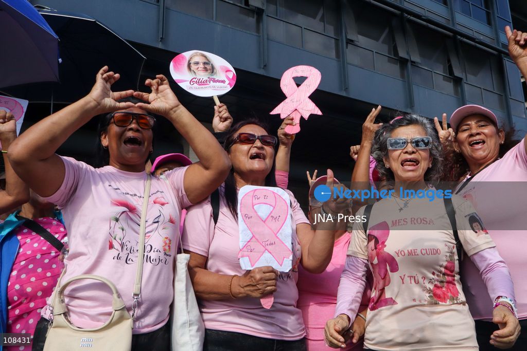 CARACAS, VENEZUELA, OCTOBER 22, 2026: Government supporters march from Plaza Venezuela towards Santa Capilla in central Caracas during a mobilisation marking Breast Cancer Awareness Month and honouring Venezuelan women. The march, called by the ruling United Socialist Party of Venezuela (PSUV), raises awareness of breast cancer and supports people affected by the disease. (Photo by Mario Flores/JNA Press via Nexpher Images)