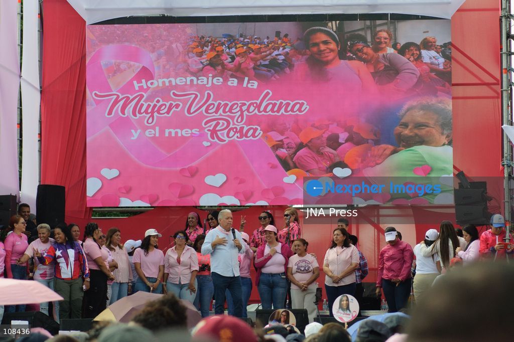 CARACAS, VENEZUELA, OCTOBER 22, 2026: Government supporters march from Plaza Venezuela towards Santa Capilla in central Caracas during a mobilisation marking Breast Cancer Awareness Month and honouring Venezuelan women. The march, called by the ruling United Socialist Party of Venezuela (PSUV), raises awareness of breast cancer and supports people affected by the disease. (Photo by Mario Flores/JNA Press via Nexpher Images)