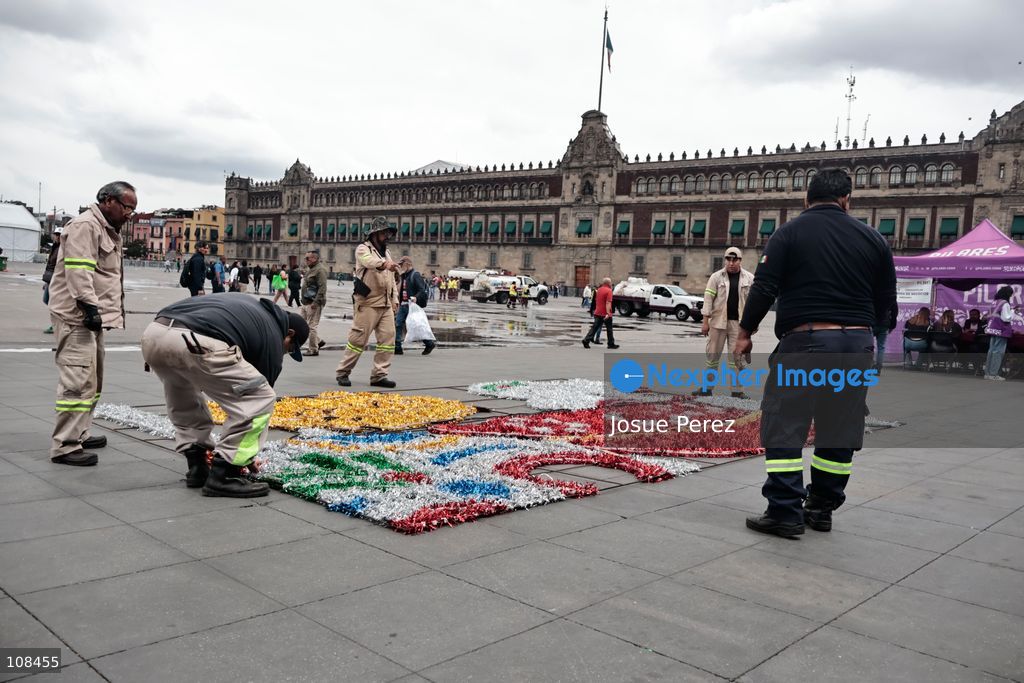 City workers begin assembling on the ground the installation that will be placed on buildings to celebrate the Day of the Dead, on October 22, 2026, in Mexico City, Mexico. Construction crews working for the Mexico City government have begun assembling and installing the structures that will illuminate the buildings surrounding the city’s Zócalo. Using cranes, cables, and various framework components, they are preparing everything for the unveiling of the Monumental Ofrenda (altar), which will feature the world’s tallest Catrina, so that both locals and tourists can enjoy the start of the Day of the Dead celebrations in Mexico. (Photo by Josue Perez/Nexpher Images)