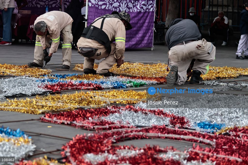 City workers begin assembling on the ground the installation that will be placed on buildings to celebrate the Day of the Dead, on October 22, 2026, in Mexico City, Mexico. Construction crews working for the Mexico City government have begun assembling and installing the structures that will illuminate the buildings surrounding the city’s Zócalo. Using cranes, cables, and various framework components, they are preparing everything for the unveiling of the Monumental Ofrenda (altar), which will feature the world’s tallest Catrina, so that both locals and tourists can enjoy the start of the Day of the Dead celebrations in Mexico. (Photo by Josue Perez/Nexpher Images)