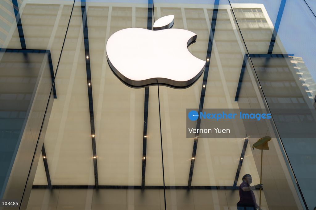 A worker cleaning the windows of an Apple Store on October 22, 2026 in Hong Kong. The iPhone DUO is Apple INC.’s first foldable phone, today is the first day the new iPhone DUO is available to the public. (Photo by Vernon Yuen/Nexpher Images)