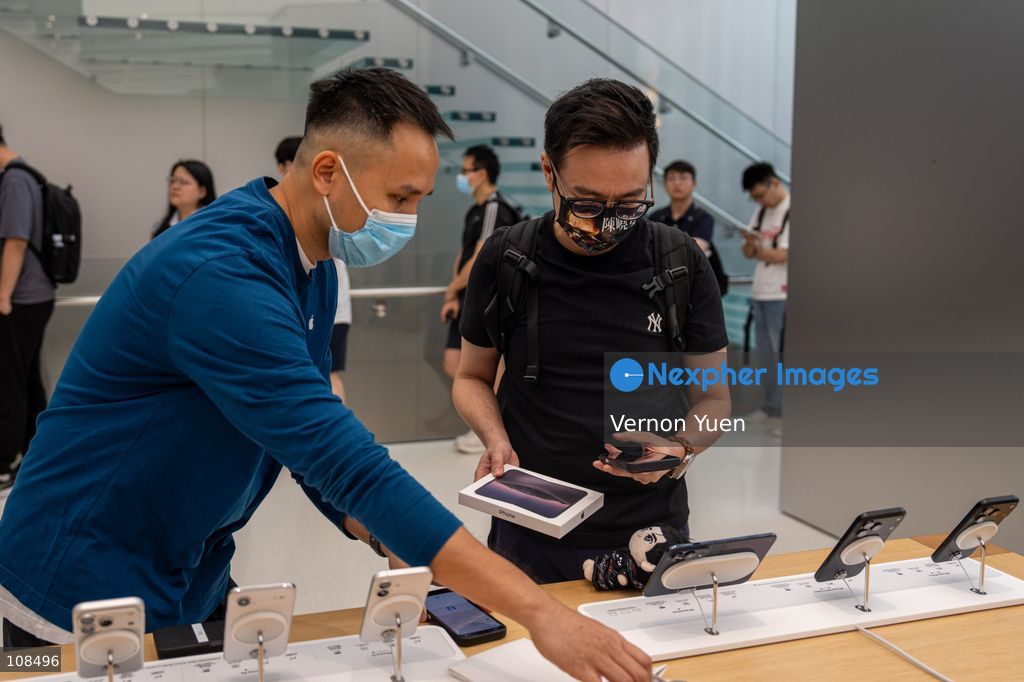 A customer picking up his iPhone DUO at an Apple Store on October 22, 2026 in Hong Kong. The iPhone DUO is Apple INC.’s first foldable phone, today is the first day the new iPhone DUO is available to the public. (Photo by Vernon Yuen/Nexpher Images)