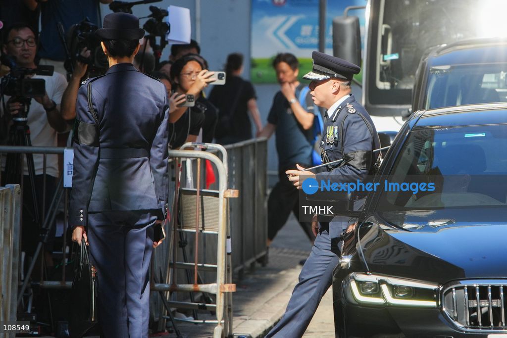 Commissioner of Police Joe Chow Yat-ming arrives at the Universal Funeral Parlour for the funeral of late police officer Chu Chun-kwok in Hung Hom, Hong Kong, on October 23, 2026. (Photo by Zulu Lo/TMHK via Nexpher Images)
