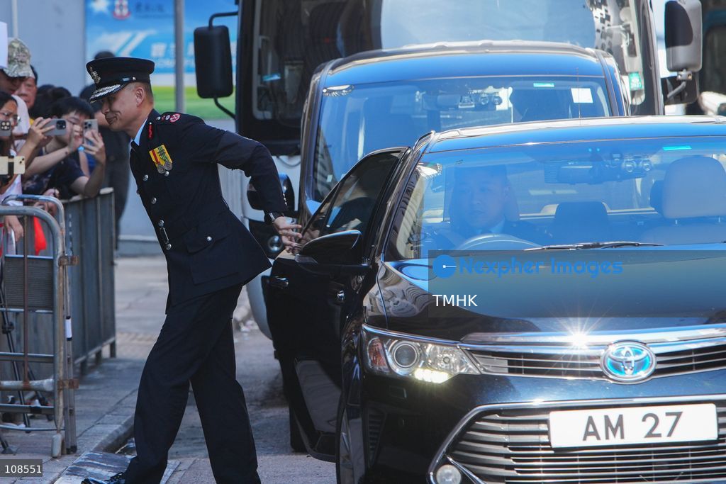 Hong Kong Director of Fire Services Andy Yeung Yan-kin arrives at the Universal Funeral Parlour for the funeral of late police officer Chu Chun-kwok in Hung Hom, Hong Kong, on October 23, 2026. (Photo by Zulu Lo/TMHK via Nexpher Images)