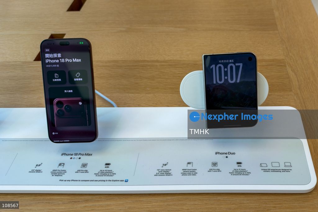 Demonstration units of Apple's new iPhone Duo and iPhone 18 Pro Max are displayed at the Apple Causeway Bay store in Hong Kong on October 23, 2026, as the company's first foldable smartphone officially goes on sale. (Photo by Kevin Li/TMHK via Nexpher Images)