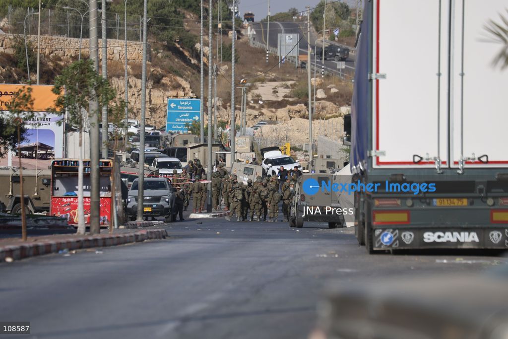 HEBRON, PALESTINE, OCTOBER 23, 2026: The scene at the Farsh al-Hawa military checkpoint in Hebron following a shooting attack targeting Israeli forces in the occupied West Bank. Israeli forces seal off the area and restrict access following the attack. (Photo by Mosab shawer/JNA Press via Nexpher Images)