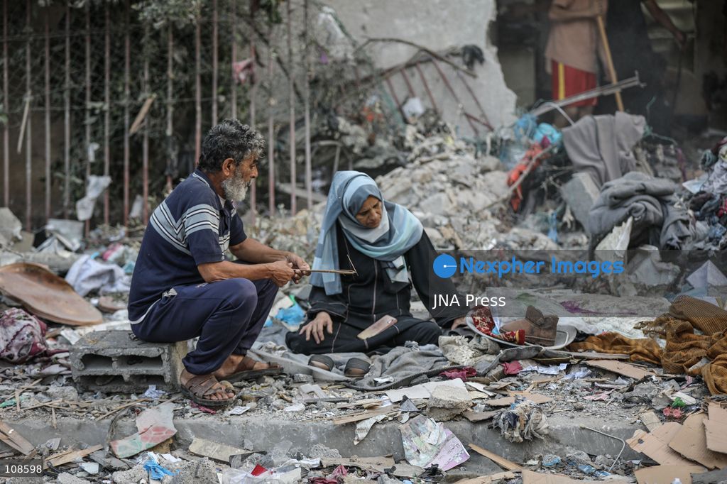 NUSEIRAT, PALESTINE, OCTOBER 23, 2026: Destruction at the site of the Hamad family home following an Israeli airstrike in Nuseirat refugee camp in the central Gaza Strip. The strike destroyed the house and damaged neighbouring homes, leaving rubble across the surrounding residential area. (Photo by Ramzi Abu Amer/JNA Press via Nexpher Images)