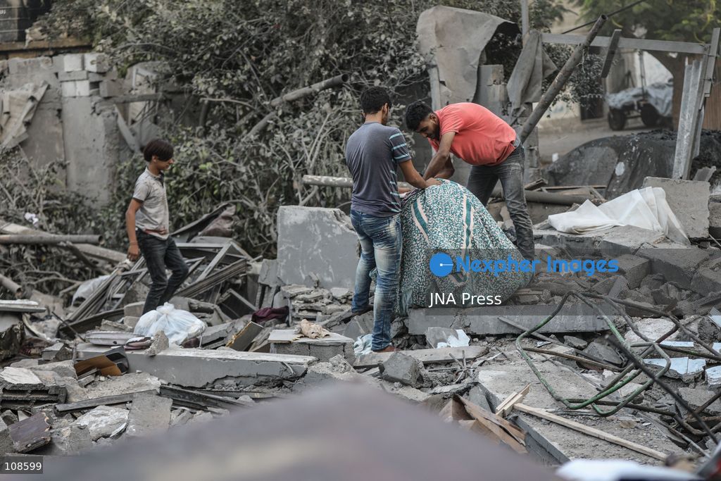 NUSEIRAT, PALESTINE, OCTOBER 23, 2026: Destruction at the site of the Hamad family home following an Israeli airstrike in Nuseirat refugee camp in the central Gaza Strip. The strike destroyed the house and damaged neighbouring homes, leaving rubble across the surrounding residential area. (Photo by Ramzi Abu Amer/JNA Press via Nexpher Images)