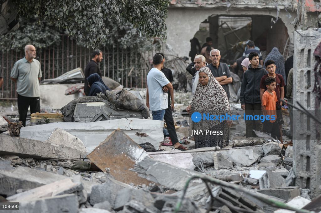 NUSEIRAT, PALESTINE, OCTOBER 23, 2026: Destruction at the site of the Hamad family home following an Israeli airstrike in Nuseirat refugee camp in the central Gaza Strip. The strike destroyed the house and damaged neighbouring homes, leaving rubble across the surrounding residential area. (Photo by Ramzi Abu Amer/JNA Press via Nexpher Images)