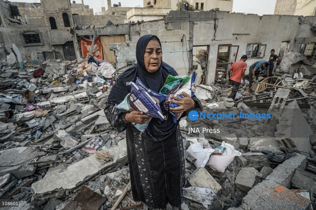 NUSEIRAT, PALESTINE, OCTOBER 23, 2026: Destruction at the site of the Hamad family home following an Israeli airstrike in Nuseirat refugee camp in the central Gaza Strip. The strike destroyed the house and damaged neighbouring homes, leaving rubble across the surrounding residential area. (Photo by Ramzi Abu Amer/JNA Press via Nexpher Images)
