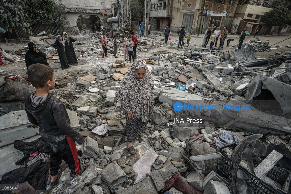 NUSEIRAT, PALESTINE, OCTOBER 23, 2026: Destruction at the site of the Hamad family home following an Israeli airstrike in Nuseirat refugee camp in the central Gaza Strip. The strike destroyed the house and damaged neighbouring homes, leaving rubble across the surrounding residential area. (Photo by Ramzi Abu Amer/JNA Press via Nexpher Images)