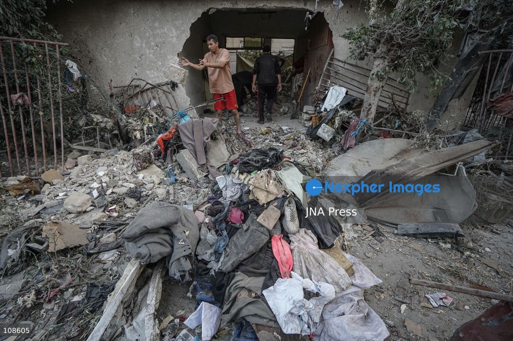 NUSEIRAT, PALESTINE, OCTOBER 23, 2026: Destruction at the site of the Hamad family home following an Israeli airstrike in Nuseirat refugee camp in the central Gaza Strip. The strike destroyed the house and damaged neighbouring homes, leaving rubble across the surrounding residential area. (Photo by Ramzi Abu Amer/JNA Press via Nexpher Images)