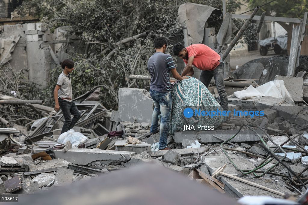 NUSEIRAT, PALESTINE, OCTOBER 23, 2026: Destruction at the site of the Hamad family home following an Israeli airstrike in Nuseirat refugee camp in the central Gaza Strip. The strike destroyed the house and damaged neighbouring homes, leaving rubble across the surrounding residential area. (Photo by Ramzi Abu Amer/JNA Press via Nexpher Images)