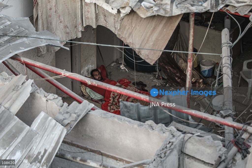 NUSEIRAT, PALESTINE, OCTOBER 23, 2026: Destruction at the site of the Hamad family home following an Israeli airstrike in Nuseirat refugee camp in the central Gaza Strip. The strike destroyed the house and damaged neighbouring homes, leaving rubble across the surrounding residential area. (Photo by Ramzi Abu Amer/JNA Press via Nexpher Images)