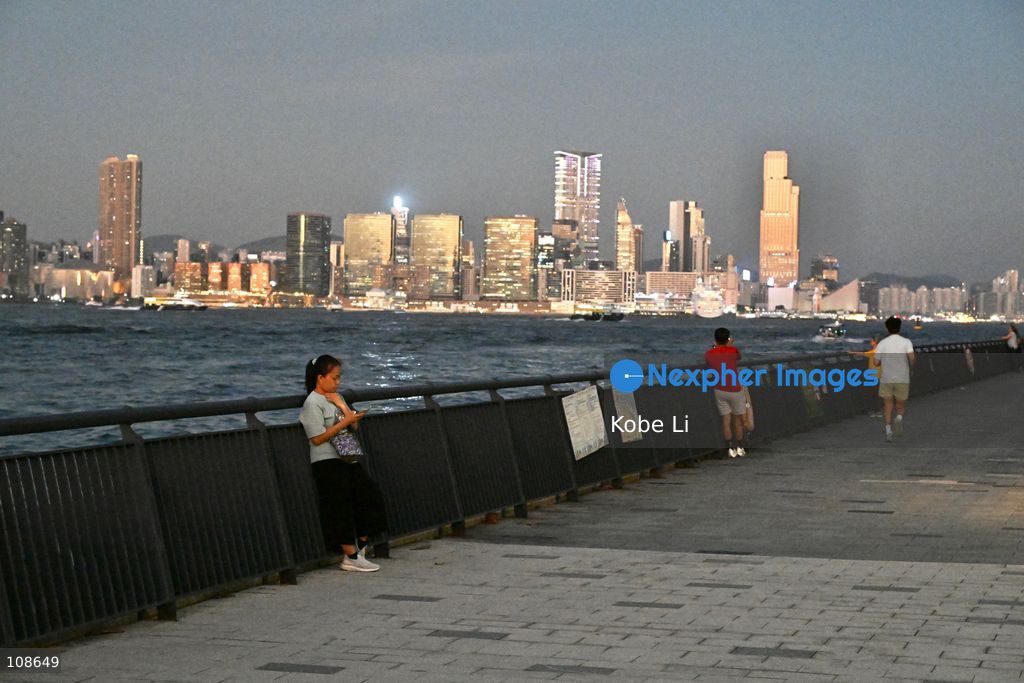 People doing exercises at waterfront near the Victoria Harbour on October 23, 2026 in Hong Kong. (Photo by Kobe Li/Nexpher Images)