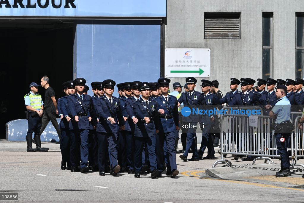 Hong Kong polices guard of honour during the coffin of late police officer Chu Chun-kwok at Universal Funeral Parlour in Hung Hom on October 23, 2026 in Hong Kong (Photo by kobe Li/Nexpher Images)
