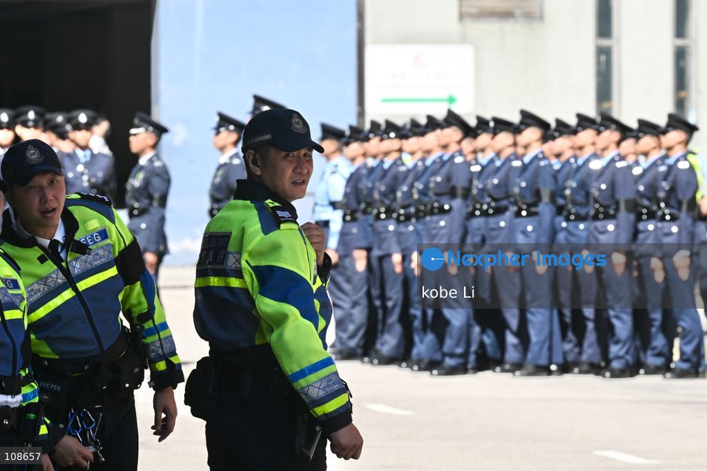 Hong Kong polices ready to ceremony during the coffin of late police officer Chu Chun-kwok at Universal Funeral Parlour in Hung Hom on October 23, 2026 in Hong Kong (Photo by kobe Li/Nexpher Images)