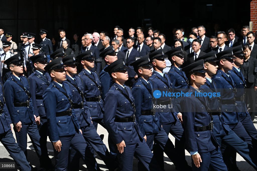 Hong Kong polices guard of honour during the coffin of late police officer Chu Chun-kwok at Universal Funeral Parlour in Hung Hom on October 23, 2026 in Hong Kong (Photo by kobe Li/Nexpher Images)