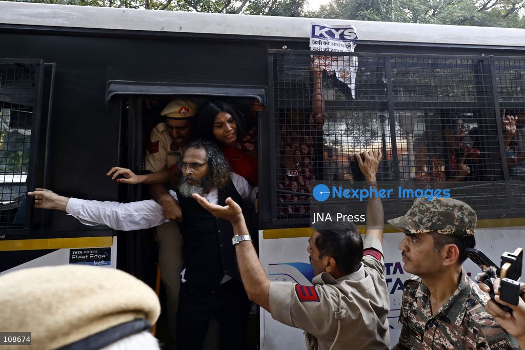 NEW DELHI, INDIA, OCTOBER 23, 2026: Police personnel detain an activist near Bangla Sahib Gurdwara during a protest demanding the resignation of Chief Election Commissioner Gyanesh Kumar. Members of student and civil society organisations attempt to march towards the Election Commission’s headquarters, opposing the Special Intensive Revision (SIR) of electoral rolls. (Photo by Vishal Kapoor/JNA Press via Nexpher Images)