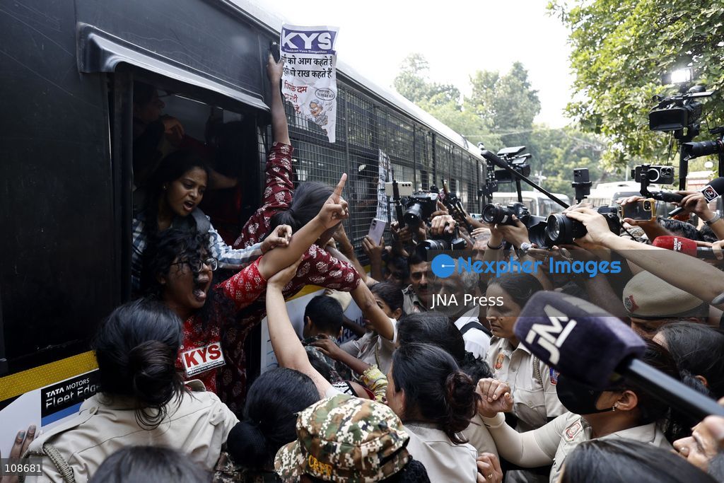 NEW DELHI, INDIA, OCTOBER 23, 2026: Police personnel detain an activist near Bangla Sahib Gurdwara during a protest demanding the resignation of Chief Election Commissioner Gyanesh Kumar. Members of student and civil society organisations attempt to march towards the Election Commission’s headquarters, opposing the Special Intensive Revision (SIR) of electoral rolls. (Photo by Vishal Kapoor/JNA Press via Nexpher Images)