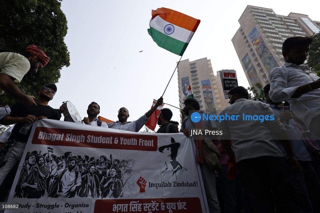 NEW DELHI, INDIA, OCTOBER 23, 2026: Police personnel detain an activist near Bangla Sahib Gurdwara during a protest demanding the resignation of Chief Election Commissioner Gyanesh Kumar. Members of student and civil society organisations attempt to march towards the Election Commission’s headquarters, opposing the Special Intensive Revision (SIR) of electoral rolls. (Photo by Vishal Kapoor/JNA Press via Nexpher Images)