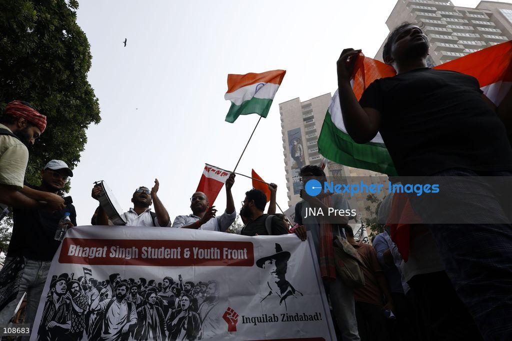 NEW DELHI, INDIA, OCTOBER 23, 2026: Police personnel detain an activist near Bangla Sahib Gurdwara during a protest demanding the resignation of Chief Election Commissioner Gyanesh Kumar. Members of student and civil society organisations attempt to march towards the Election Commission’s headquarters, opposing the Special Intensive Revision (SIR) of electoral rolls. (Photo by Vishal Kapoor/JNA Press via Nexpher Images)