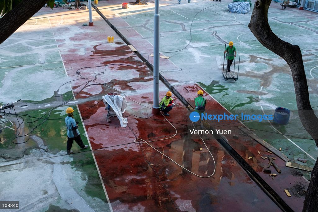 A general view showing construction workers working on a playground on October 24, 2026 in Hong Kong. (Photo by Vernon Yuen/Nexpher Images)