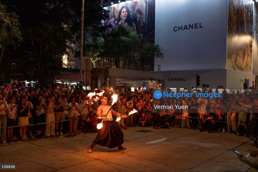A fire dance performance at a halloween event on October 24, 2026 in Hong Kong. (Photo by Vernon Yuen/Nexpher Images)