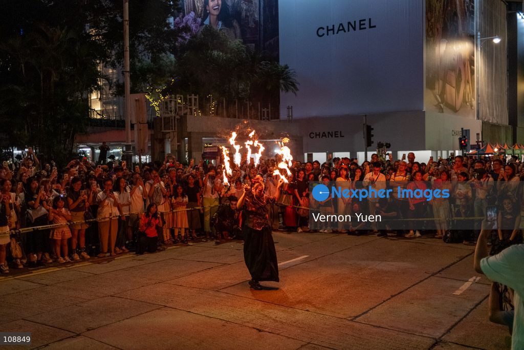 A fire dance performance at a halloween event on October 24, 2026 in Hong Kong. (Photo by Vernon Yuen/Nexpher Images)