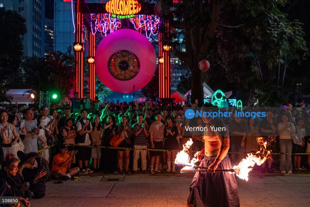 A fire dance performance at a halloween event on October 24, 2026 in Hong Kong. (Photo by Vernon Yuen/Nexpher Images)