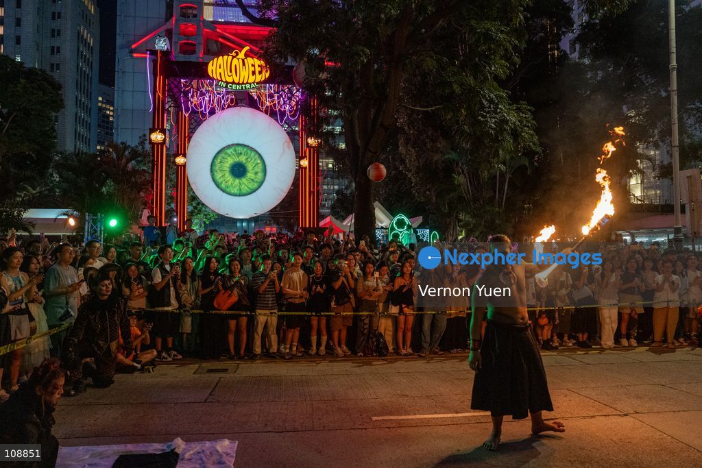 A fire dance performance at a halloween event on October 24, 2026 in Hong Kong. (Photo by Vernon Yuen/Nexpher Images)
