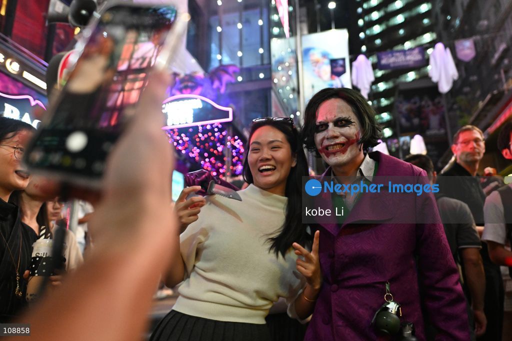 Visitors cosplaying and posing photo at Lan Kwai Fong in Central on the eve of Halloween on October 24, 2026 in Hong Kong. (Photo by kobe Li/Nexpher Images)