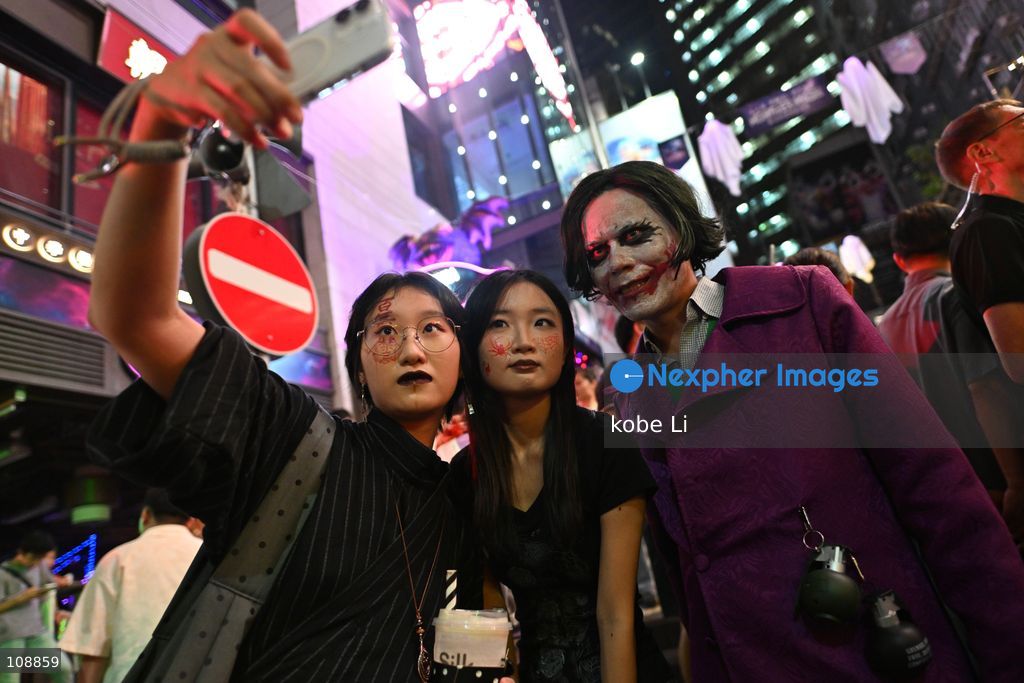 Visitors cosplaying and posing photo at Lan Kwai Fong in Central on the eve of Halloween on October 24, 2026 in Hong Kong. (Photo by kobe Li/Nexpher Images)