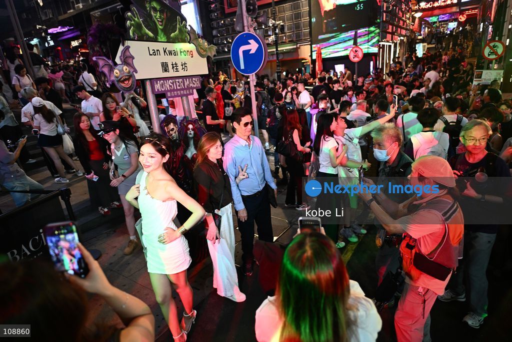Visitors cosplaying and posing photo at Lan Kwai Fong in Central on the eve of Halloween on October 24, 2026 in Hong Kong. (Photo by kobe Li/Nexpher Images)
