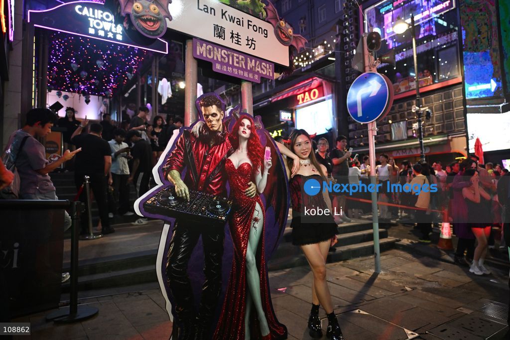 Visitors cosplaying and posing photo at Lan Kwai Fong in Central on the eve of Halloween on October 24, 2026 in Hong Kong. (Photo by kobe Li/Nexpher Images)