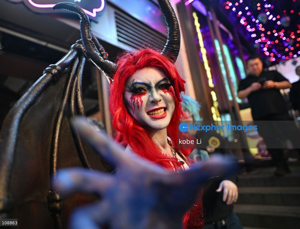 A lady cosplaying at Lan Kwai Fong in Central on the eve of Halloween on October 24, 2026 in Hong Kong. (Photo by kobe Li/Nexpher Images)