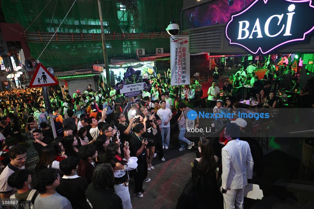 Visitors cosplaying and posing photo at Lan Kwai Fong in Central on the eve of Halloween on October 24, 2026 in Hong Kong. (Photo by kobe Li/Nexpher Images)