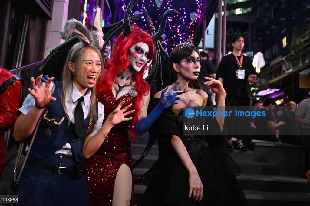 Visitors cosplaying and posing photo at Lan Kwai Fong in Central on the eve of Halloween on October 24, 2026 in Hong Kong. (Photo by kobe Li/Nexpher Images)