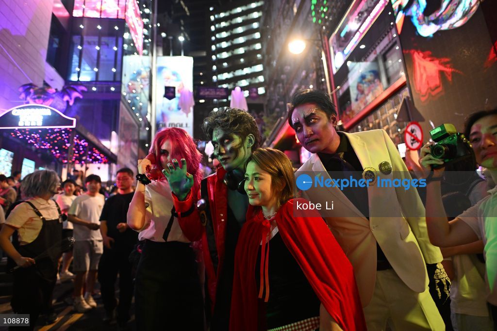 Visitors cosplaying and posing photo at Lan Kwai Fong in Central on the eve of Halloween on October 24, 2026 in Hong Kong. (Photo by kobe Li/Nexpher Images)
