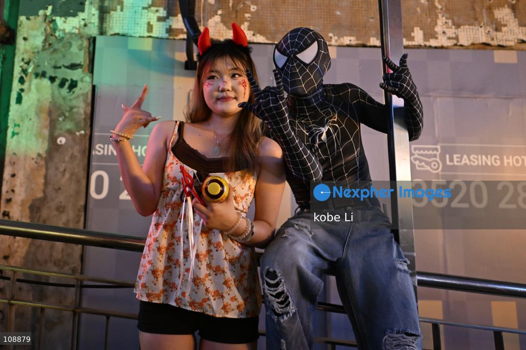 Visitors cosplaying and posing photo at Lan Kwai Fong in Central on the eve of Halloween on October 24, 2026 in Hong Kong. (Photo by kobe Li/Nexpher Images)