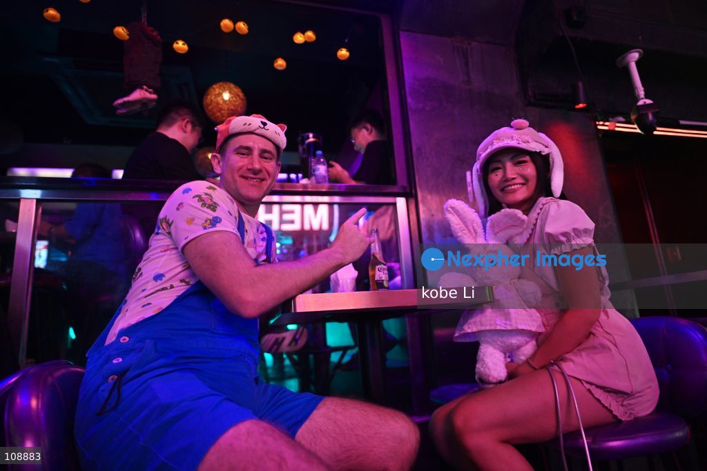 Visitors cosplaying and drinking at a bar of Lan Kwai Fong in Central on the eve of Halloween on October 24, 2026 in Hong Kong. (Photo by kobe Li/Nexpher Images)