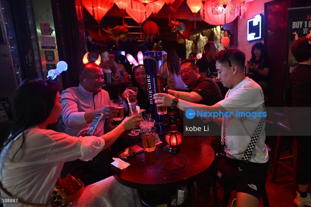 Visitors drinking at a bar of Lan Kwai Fong in Central on the eve of Halloween on October 24, 2026 in Hong Kong. (Photo by kobe Li/Nexpher Images)